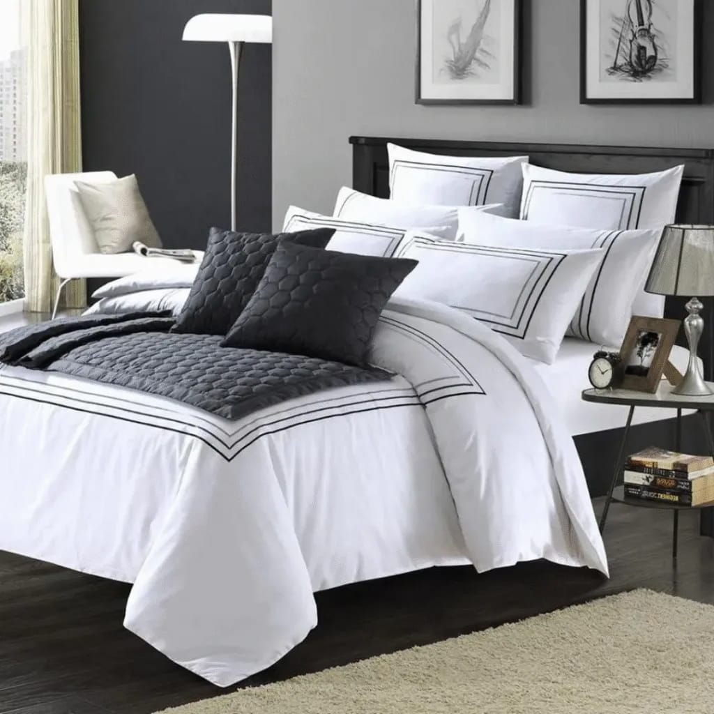 hotel-bed-linen-sets-neatly-arranged-on-a-made-hotel-bed
