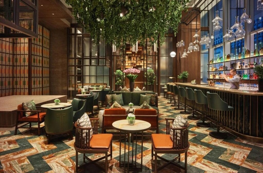 hotel-lobby-bar-design-space-with-cozy-atmosphere-and-tables