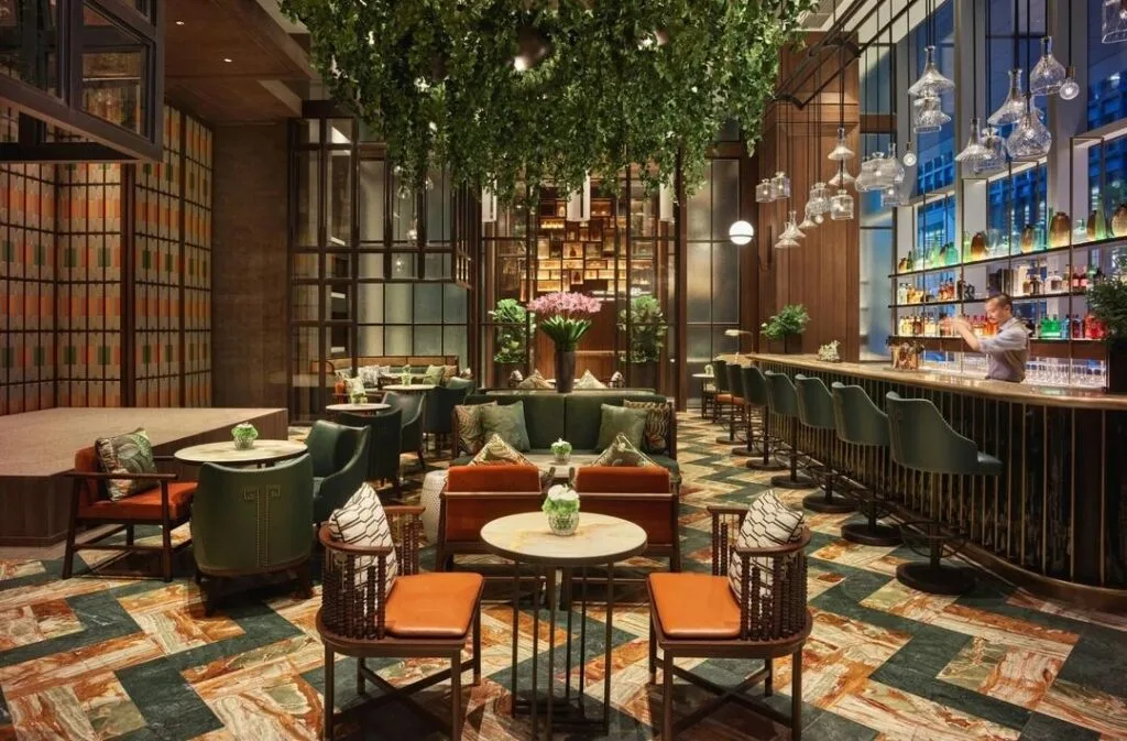hotel-lobby-bar-design-space-with-cozy-atmosphere-and-tables